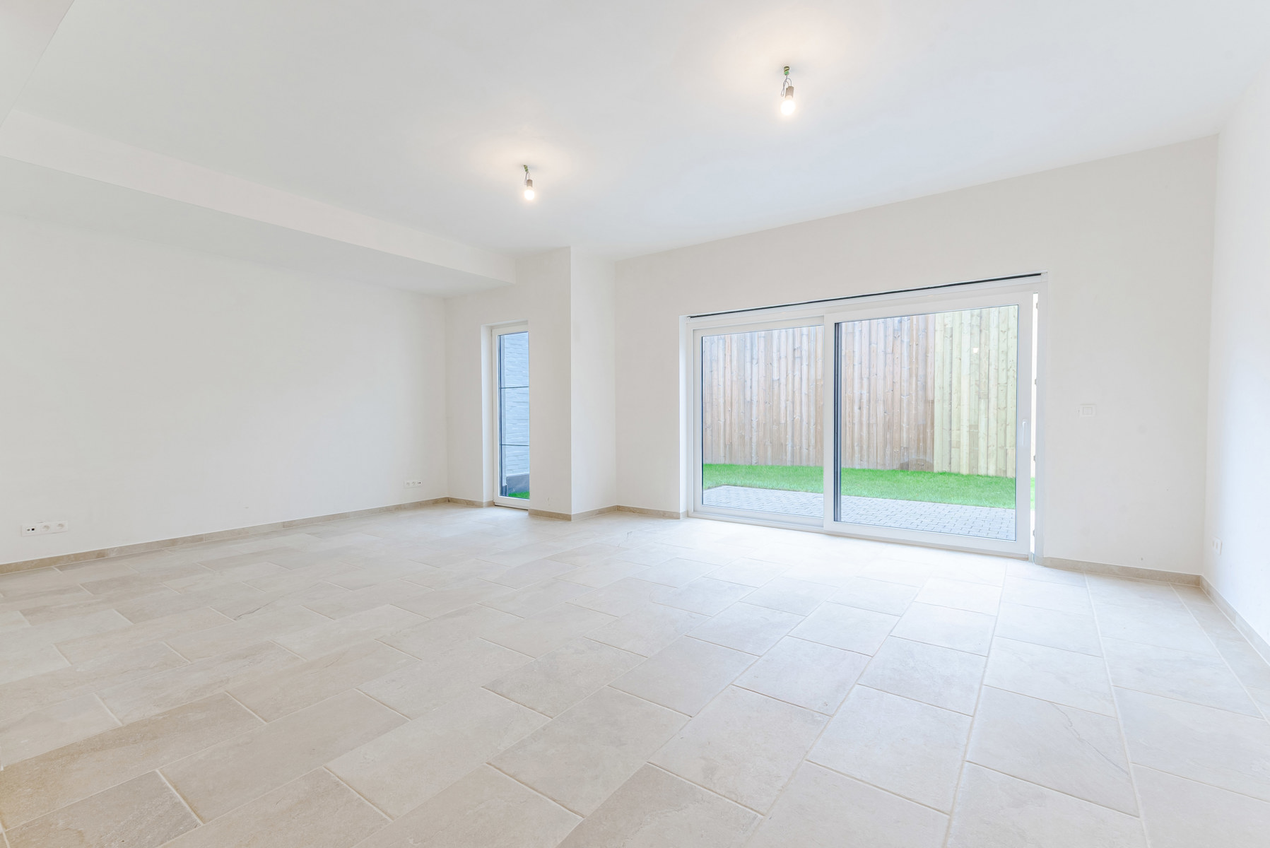 Centraal gelijkvloers 1-slpk app met tuinterras en garage - foto 5