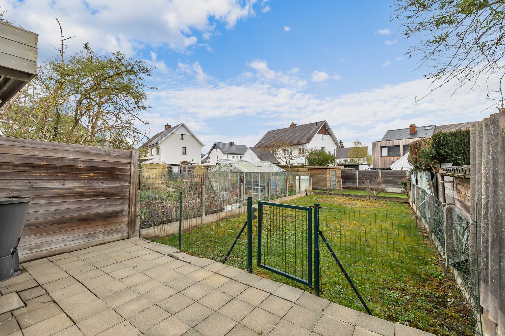 Halfopen bebouwing met garage en tuin in Ternat! - foto 4