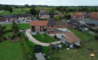 Stroopstokerij van Vrolingen met grotendeels gerenoveerde woning met6 slaapkamers en achterliggende loods op een mooi perceel van 35 are 21 ca.*GEEN...