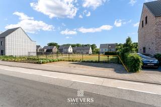 Voor meer info en foto’s, surf naar www.swevers.be – In een rustige straat in Ravels wacht deze bouwgrond van 5a 65ca op jouw droomwoning. Het...