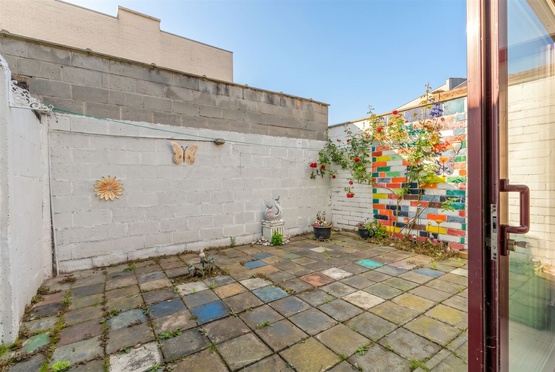Op te frissen starterswoning met stadstuin! - foto 4