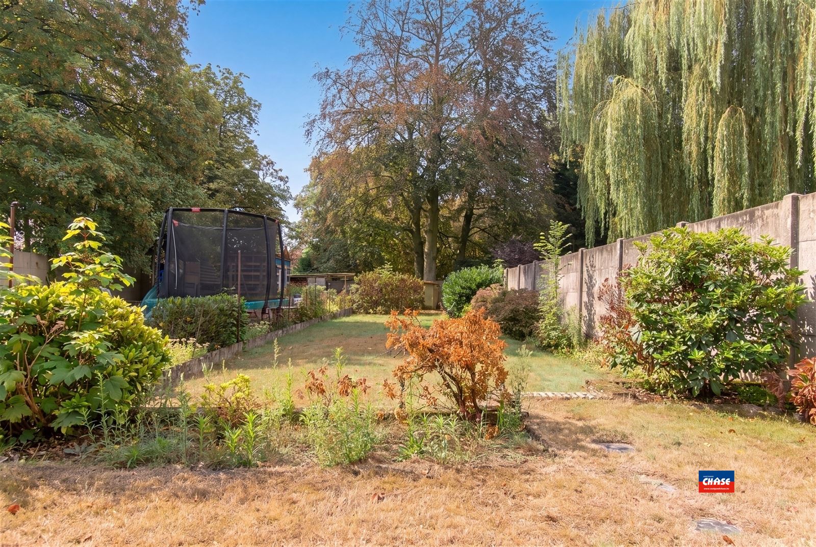 Charmante (op te frissen) rijwoning met 3 à 4 slaapkamers en prachtige tuin - foto 3