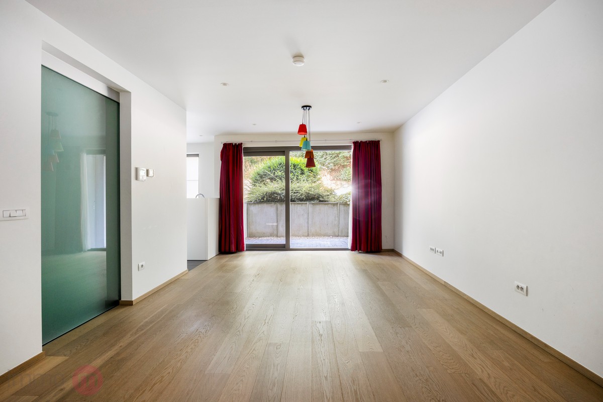 Recent gelijkvloers app. met 2 slaapkamers, tuin en 2 autostaanplaatsen. - foto 4