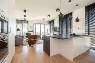 Welcome to the 13th floor of De Lichttoren at 81 Ellermanstraat - where space, light and views come together in a unique living experience. With...