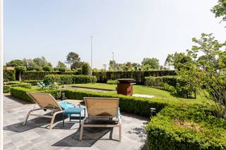 EXCLUSIVE: Luxury Villa Designed by Renowned Architect H. Demyttenaere (2014)<br /><br />This prestigious villa, designed in 2014 by the acclaimed architect H. Demyttenaere, seamlessly combines timeless elegance with modern living comfort. The fully south-facing garden not only guarantees maximum sunlight exposure but also offers an unobstructed view, radiating peace and space.<br /><br />Upon entering, you are welcomed into a stylish entrance hall with cloakroom and guest toilet, after which the home opens into a warm living area with fireplace and an inviting library corner. Adjoining is the dining room and a high-end Bulthaup kitchen with Miele appliances, featuring a central island and a cosy breakfast nook — perfect for those who value refinement and functionality.<br /><br />The property offers a double integrated garage and a spacious driveway with room for up to five cars, while a practical cellar provides additional storage space.<br /><br />On the first floor, the master suite boasts a generous walk-in dressing and a luxurious bathroom with separate toilet. Three further bedrooms are located on this floor, one of which currently serves as a spacious home office, alongside two additional bathrooms and a separate laundry room.<br /><br />The second floor features a fully equipped fitness room — which may also serve as an additional bedroom — as well as an attic space for extra storage.<br /><br />This villa is the perfect choice for those seeking space, comfort, and premium finishes in one of the most sought-after locations.