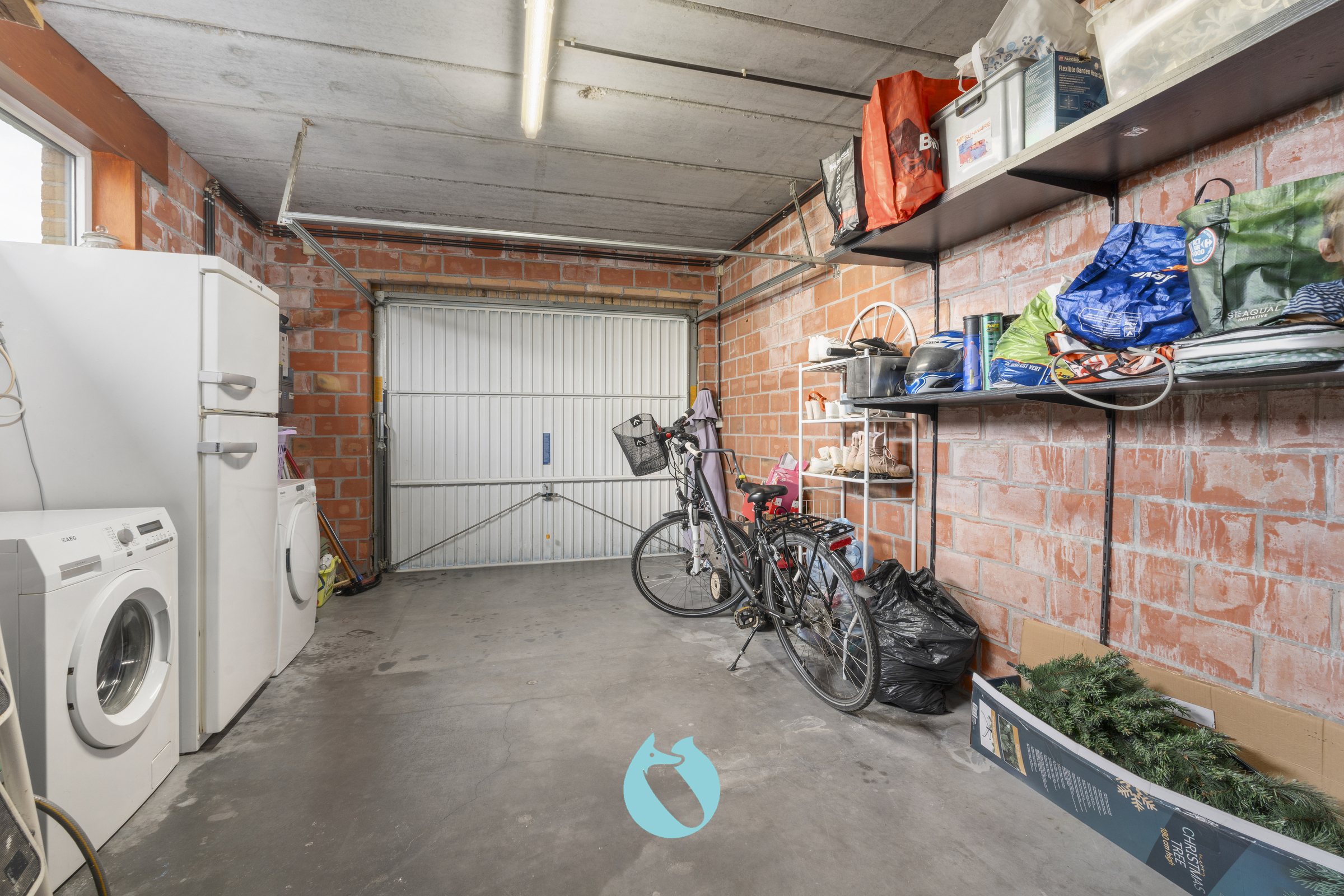 Gelijkvloers appartement met 2 slpks, tuin en garage - foto 2