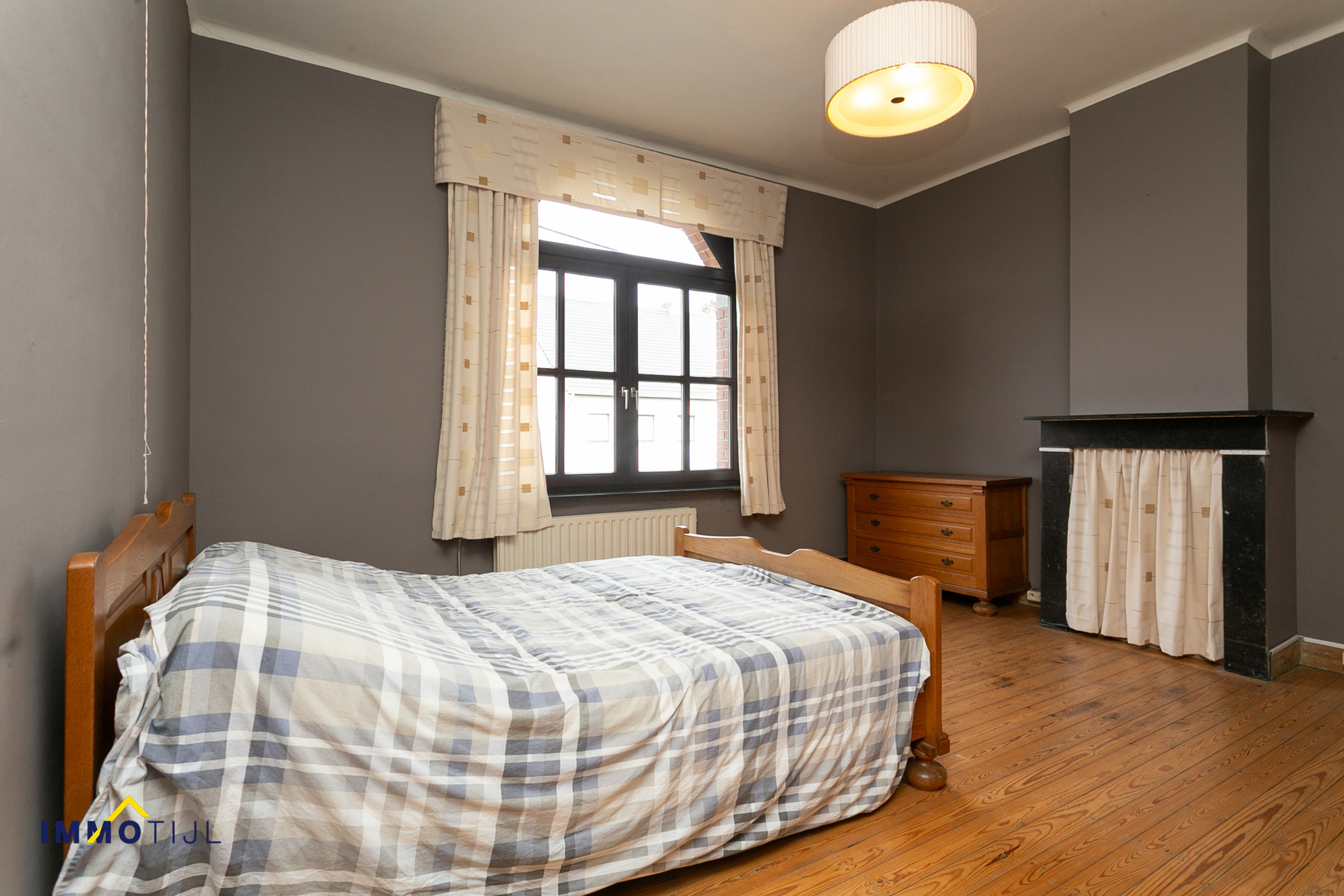 Ruime woning met prachtige gevel en tal van mogelijkheden! - foto 3