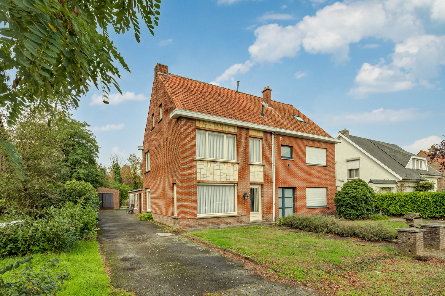 Halfopen woning op 575 m² met garage, carport en diepe tuin – te renoveren - foto 1