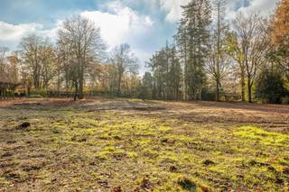 Zuidgerichte villagrond aanpalend het park van Schoten.Oppervlakte: 1.876m² | straatbreedte 20m + breder uitwaaiend naar achteren...