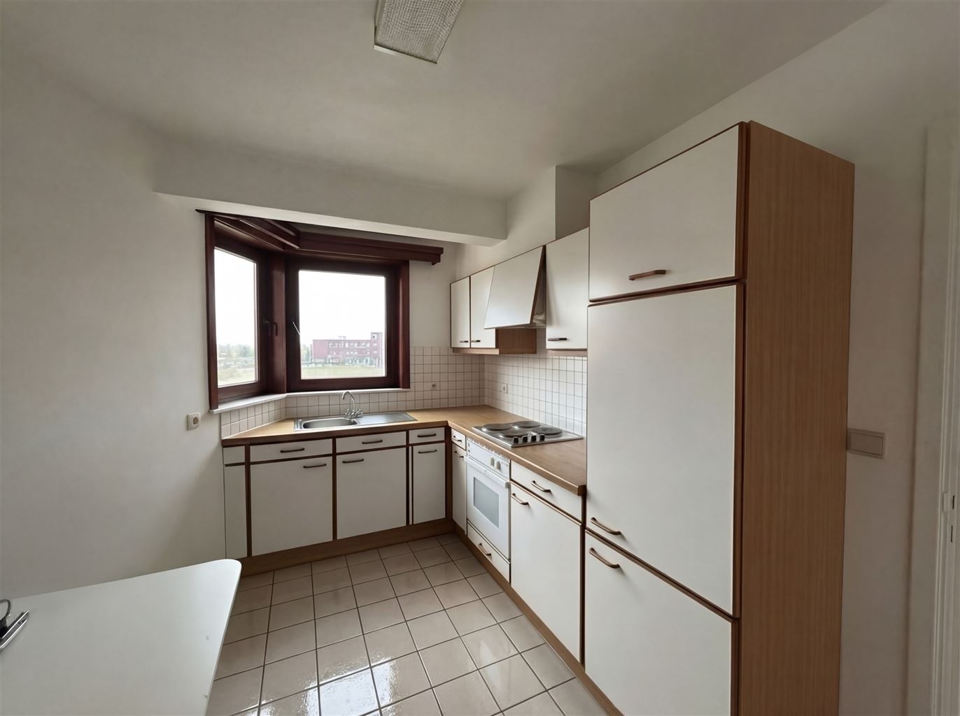 Gezellig appartement met 2 slaapkamers en terrasje nabij het centrum van Maaseik. - foto 3