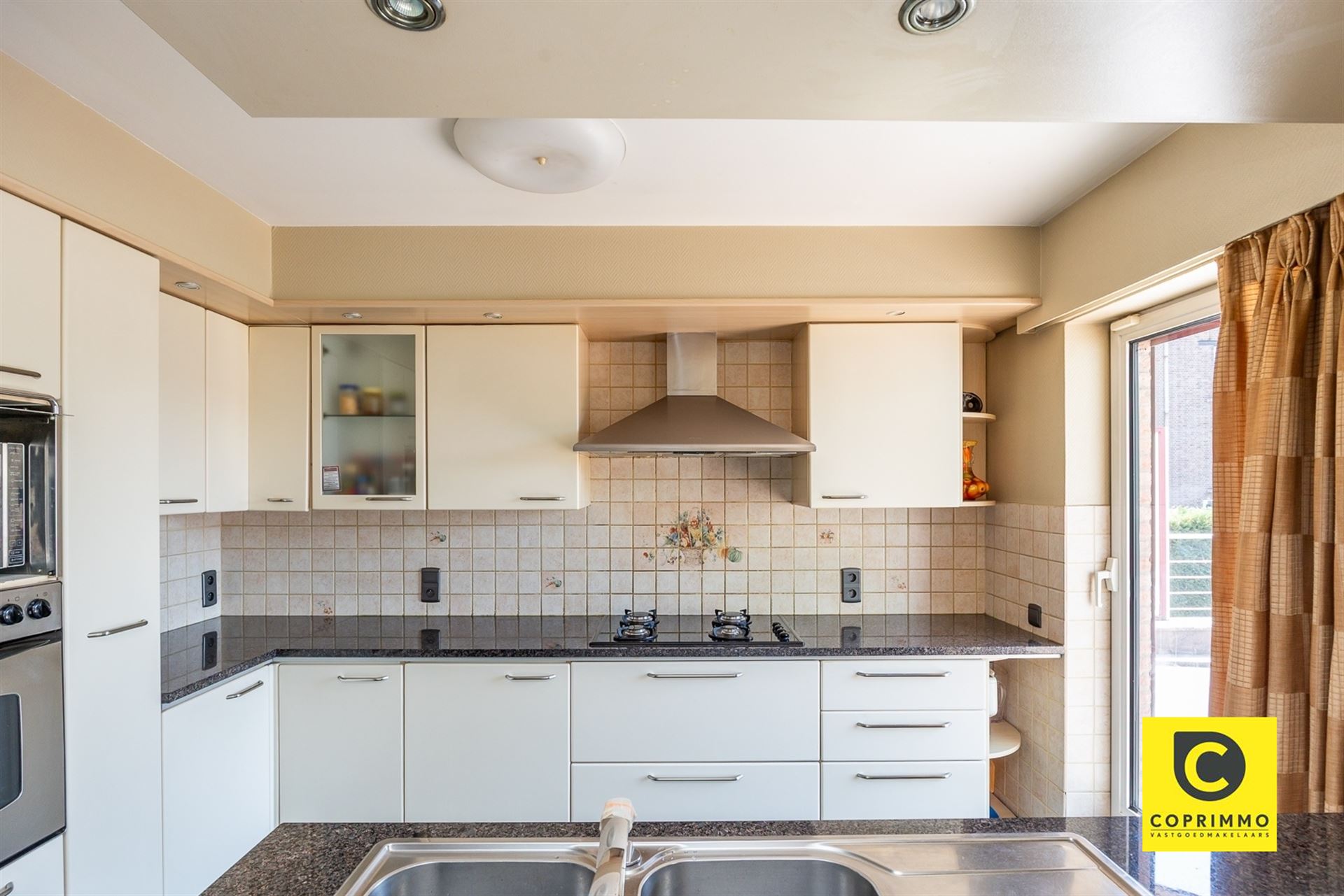 Riante woning met Z-tuin in de Oosterveldwijk ! - foto 5