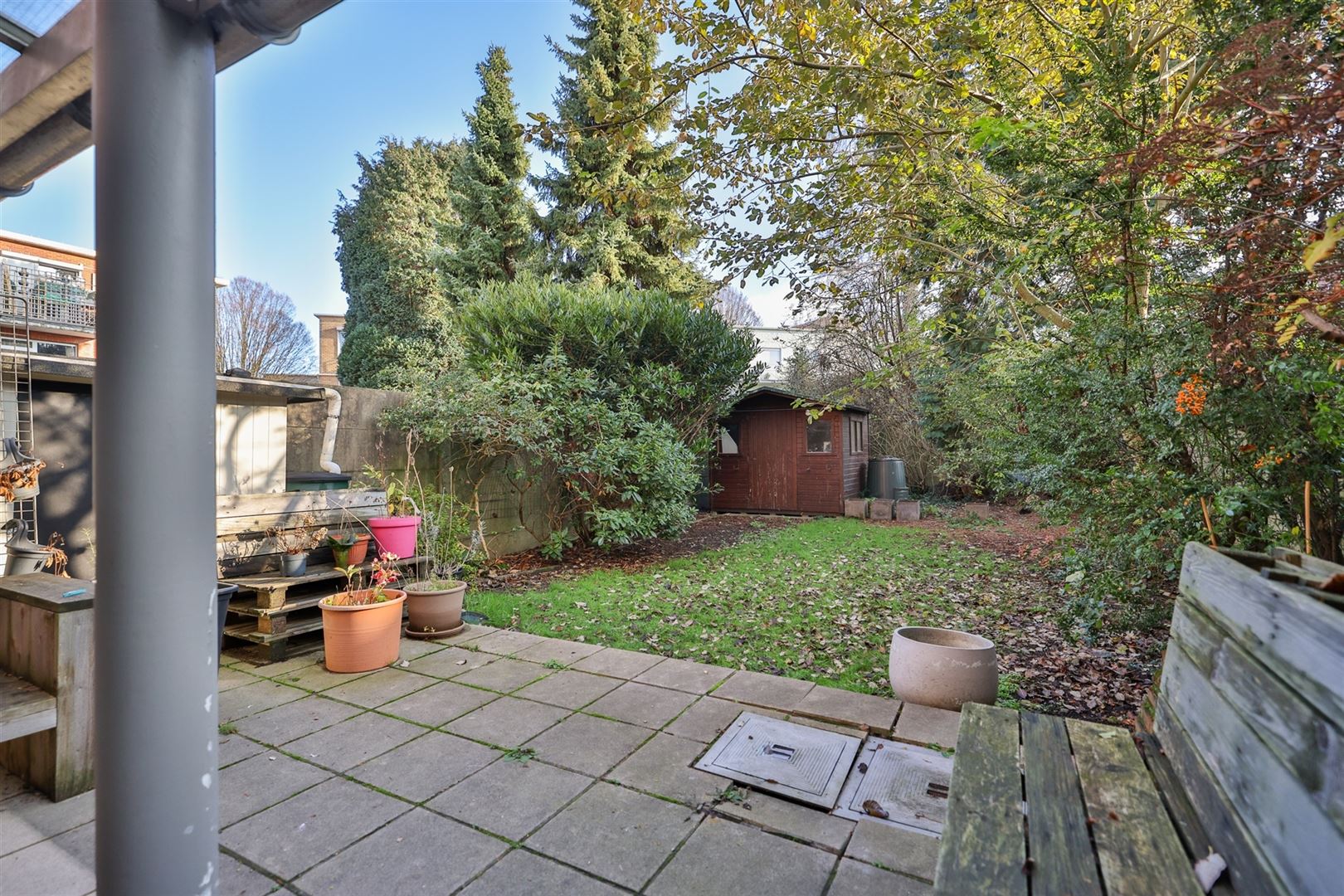 Ruim gelijkvloers appartement met aangelegde tuin - foto 2