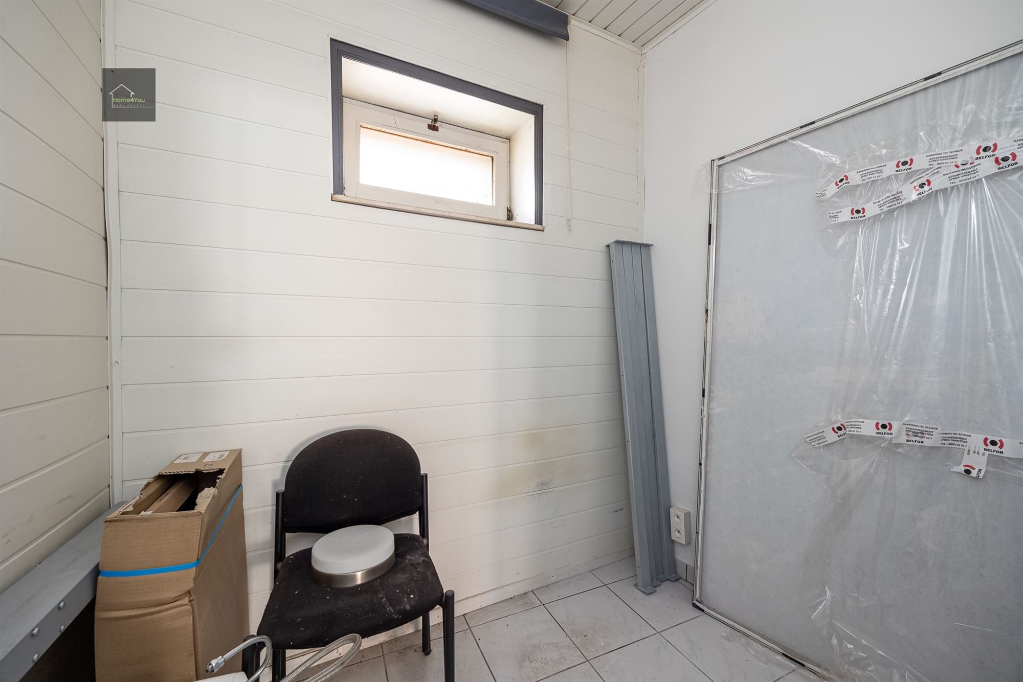 Gelijkvloers handelspand met garage en privatieve tuin - foto 5