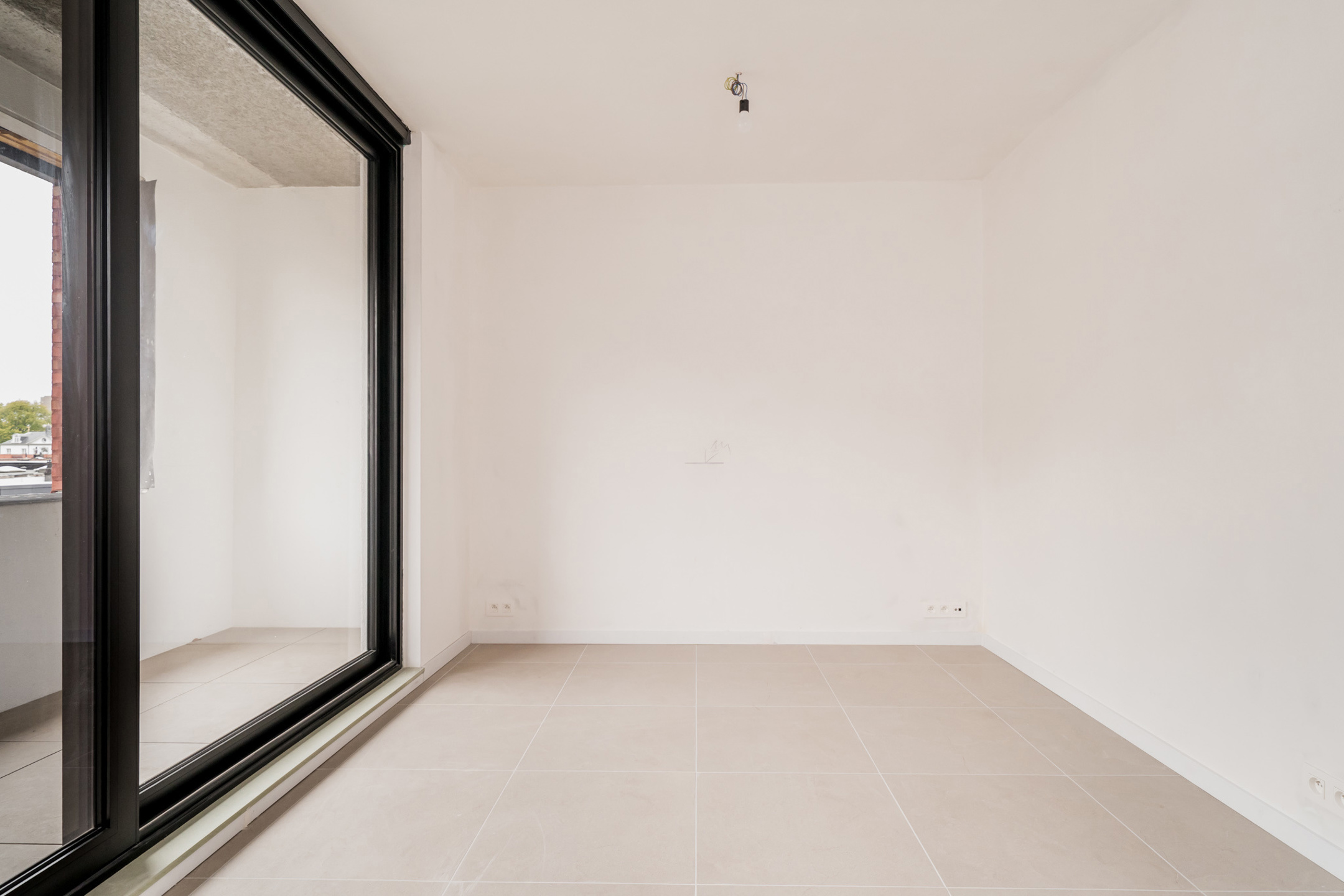 Modern 1-slaapkamerappartement met Zuidgericht terras - foto 4