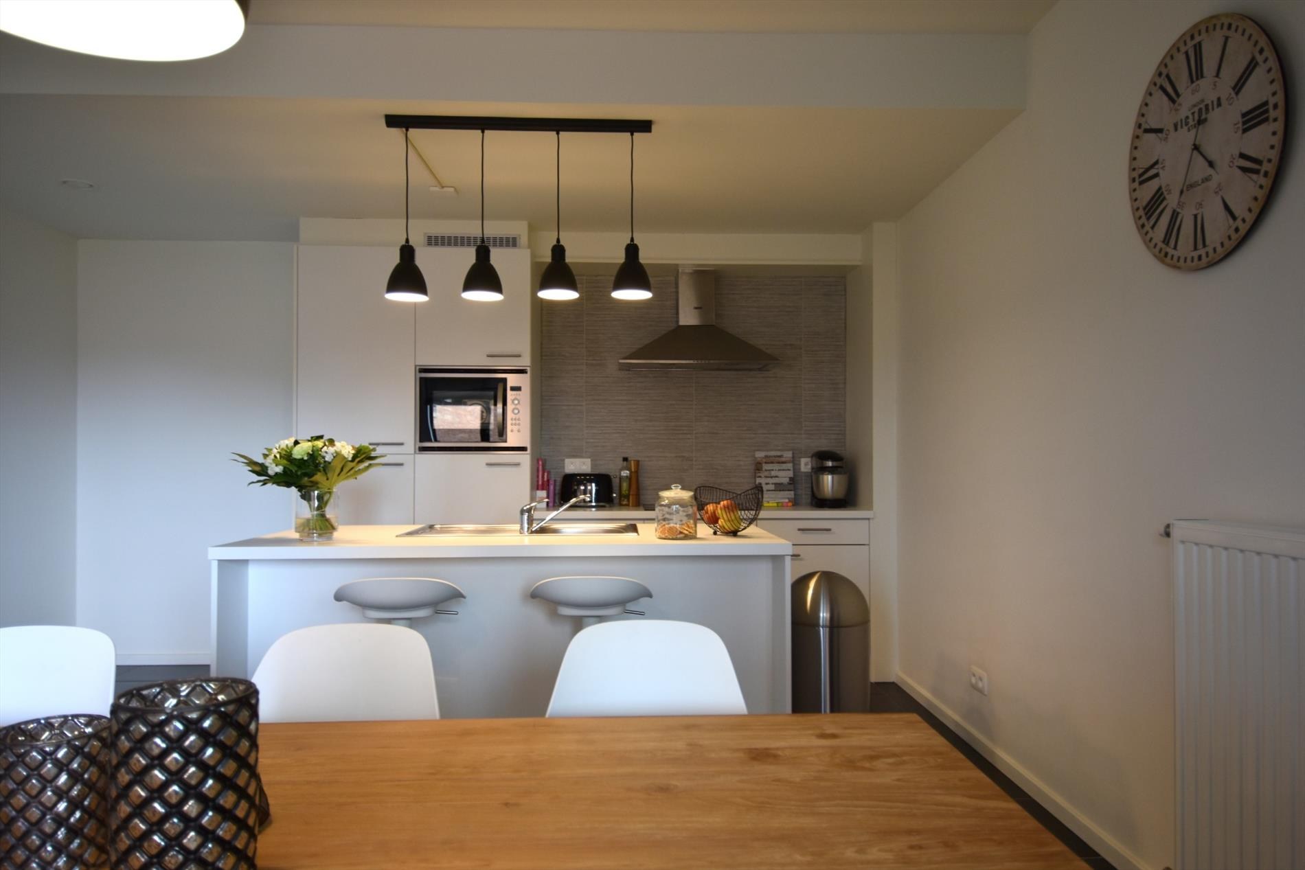 Leuk appartement met 2 slaapkamers, staanplaats en kelderberging - foto 4