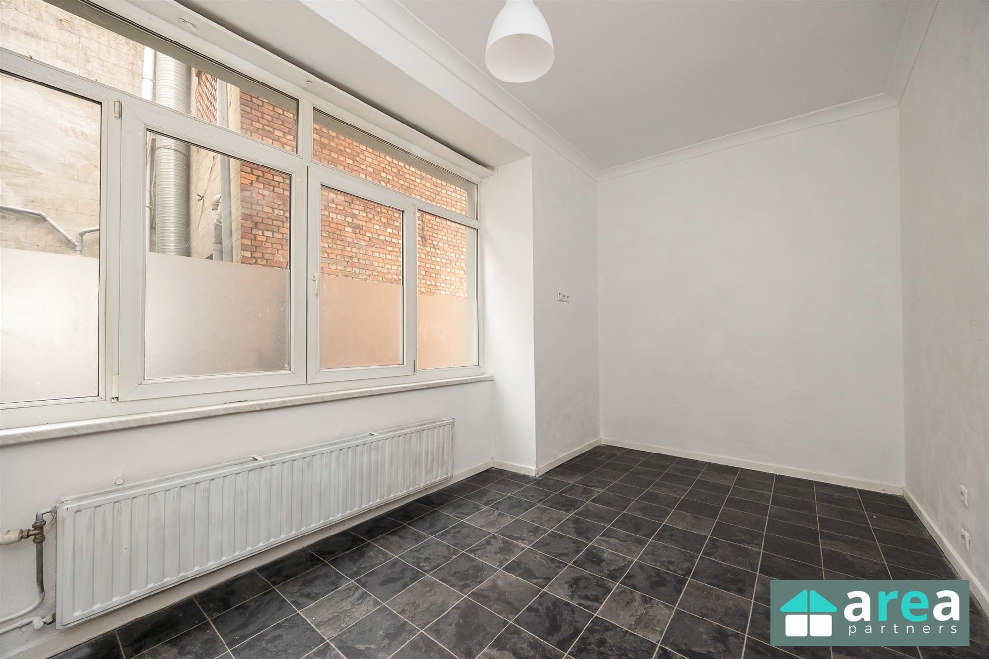 Opbrengsteigendom bestaande uit handelszaak + 3 appartementen - foto 4