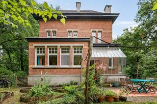 <p><span> </span></p><p><span>Characterful and historic house on approximately 1,660 m² in green oasis within walking distance of the center of Maria ter Heide. </span></p><p><span>This authentic "officers house" is located on the Diksmuidelei in Brasschaat and was thoroughly renovated a few years ago. </span></p><p><span> </span></p><p><span>Layout</span></p><p><span>You enter the house through the entrance hall with stairs to the first floor and guest toilet. From this central entrance hall you reach the various living spaces, with an office or study at the front of the house. Spacious lounge with fireplace and adjacent dining room with several windows overlooking the garden. From the dining room as well as from the entrance hall you have access to the spacious kitchen with breakfast room or dining area. From the kitchen access to the garden and terrace. </span></p><p><span> </span></p><p><span>1st floor</span></p><p><span>Night hall giving access to a master suite composed of a bedroom with dressing room and private bathroom. Another spacious bedroom or second office and a second bathroom. </span></p><p><span> </span></p><p><span>2nd Floor</span></p><p><span>Through the fixed staircase you reach the fully equipped second floor with a large multipurpose room, as well as two more bedrooms. There are provisions for furnishing a third bathroom or a kitchenette. </span></p><p><span> </span></p><p><span>Basement</span></p><p><span>The house is fully basement at standing height with storage cellar, wine cellar and laundry room.</span></p><p><span> </span></p><p><span>Garden and outdoor spaces</span></p><p><span>The house is surrounded by a natural park garden with mature trees. In the garden you will enjoy peace and privacy. Terrace as well as a storage room near the terrace. Ample parking is provided on site, with possibilities to build a garage or garden shed.</span></p><p><span> </span></p><p><span>Details</span></p><p><span>This charming home was built at the beginning of the 20th century using timeless materials and lots of character. In 2005 the house was thoroughly renovated while maintaining its charm and valuable elements. The roof was completely renewed, as well as new windows were installed, utilities such as electrical installation and central heating installation were renewed. The property has been neatly maintained and is in a good state of general maintenance. </span></p><p><span>This property is subject to the renovation obligation. Buildings with an energy label E or F must be fitted with energy-saving measures within five years of purchase to achieve at least a D label. </span></p><p><span> </span></p><p><span>More information through our office. </span></p>