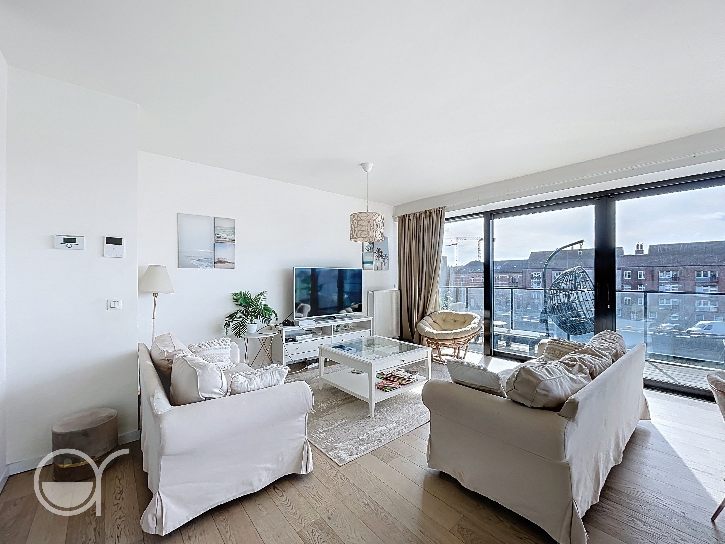 Lichtrijk 2-slaapkamerappartement met terras, kelderberging en autostaanplaats - foto 4