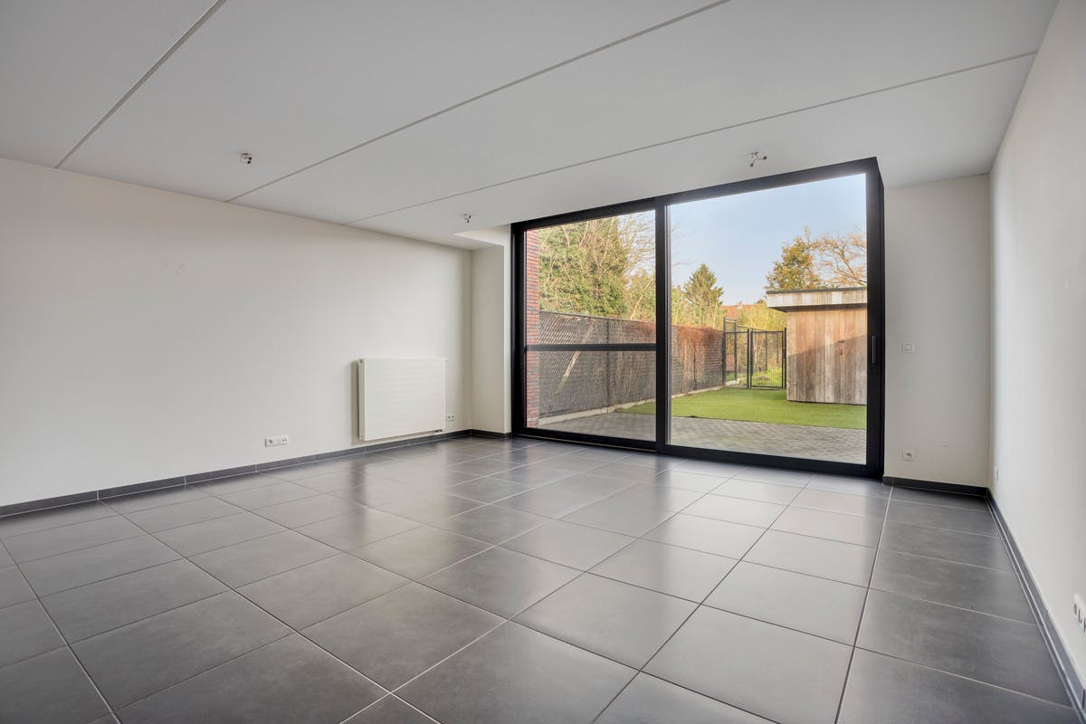 Instapklaar gelijkvloers appartement met aangename tuin - foto 4