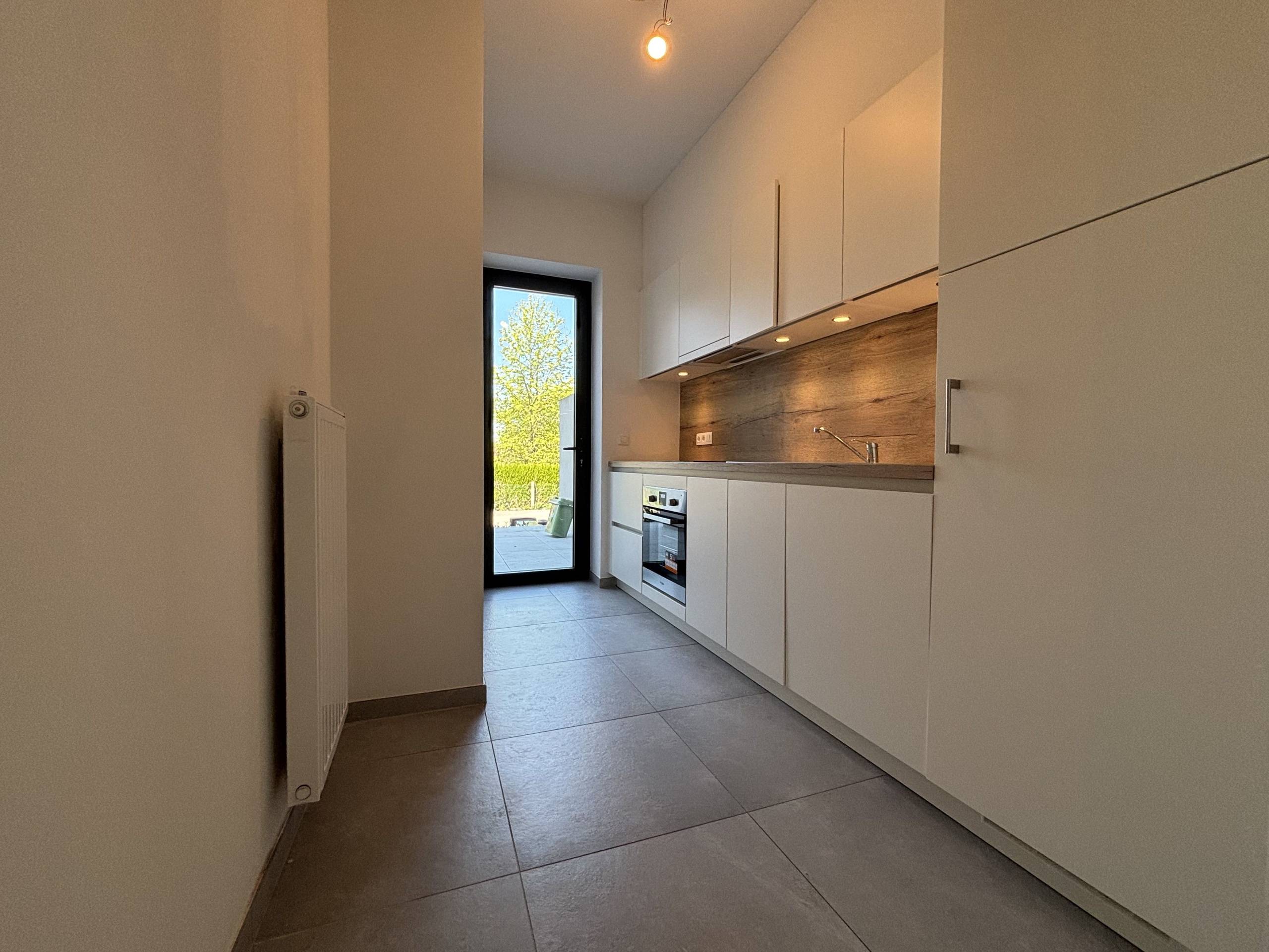 Instapklaar gelijkvloers appartement met terras en autostaanplaats in Zottegem - foto 5