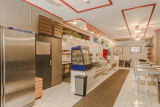 <p><strong>Spacious Commercial Property with Residence in a Prime Location in the Heart of Turnhout</strong></p>
<p>Are you looking for a versatile property with countless possibilities? This surprisingly spacious building, currently set up as a commercial space with an integrated residence, offers a unique opportunity to combine living and working in one location.</p>
<p>The ground floor boasts an exceptionally large commercial area, ideal for a wide range of business activities. Thanks to its flexible layout, internal walls can easily be modified or repositioned to suit your specific needs—perfect for use as a retail space, office, practice, or studio.</p>
<p>Upstairs, the residential area is generously laid out and features multiple bedrooms, a cozy living room, and a fully equipped kitchen. Additional highlights include a spacious, partially covered terrace on the first floor and a lovely city courtyard at the rear—rare features for a centrally located property.</p>
<p>Situated on the vibrant Merodelei, a busy and highly visible arterial road, this property benefits from excellent exposure. It’s just a stone's throw from Turnhout’s central train station, offering great accessibility via public transport and major roadways. Shops, schools, and essential amenities are all within walking distance.</p>
<p><strong>An extra advantage</strong>: the current interior setup can be taken over under <strong>favorable terms</strong>, if desired. What’s more, in consultation, it is possible to <strong>start using the property immediately after signing the preliminary agreement</strong>, so your project can get underway without delay.</p>
<p>In short, this is a property full of potential—offering space, flexibility, and a strategic location—ideal for anyone looking to combine business and living in the heart of Turnhout.</p>