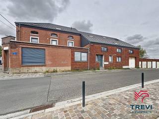 Trevi la Propriété vous présente cet ensemble immobilier exceptionnel situé Rue de la Cure à Farciennes, offrant un rendement locatif potentiel...