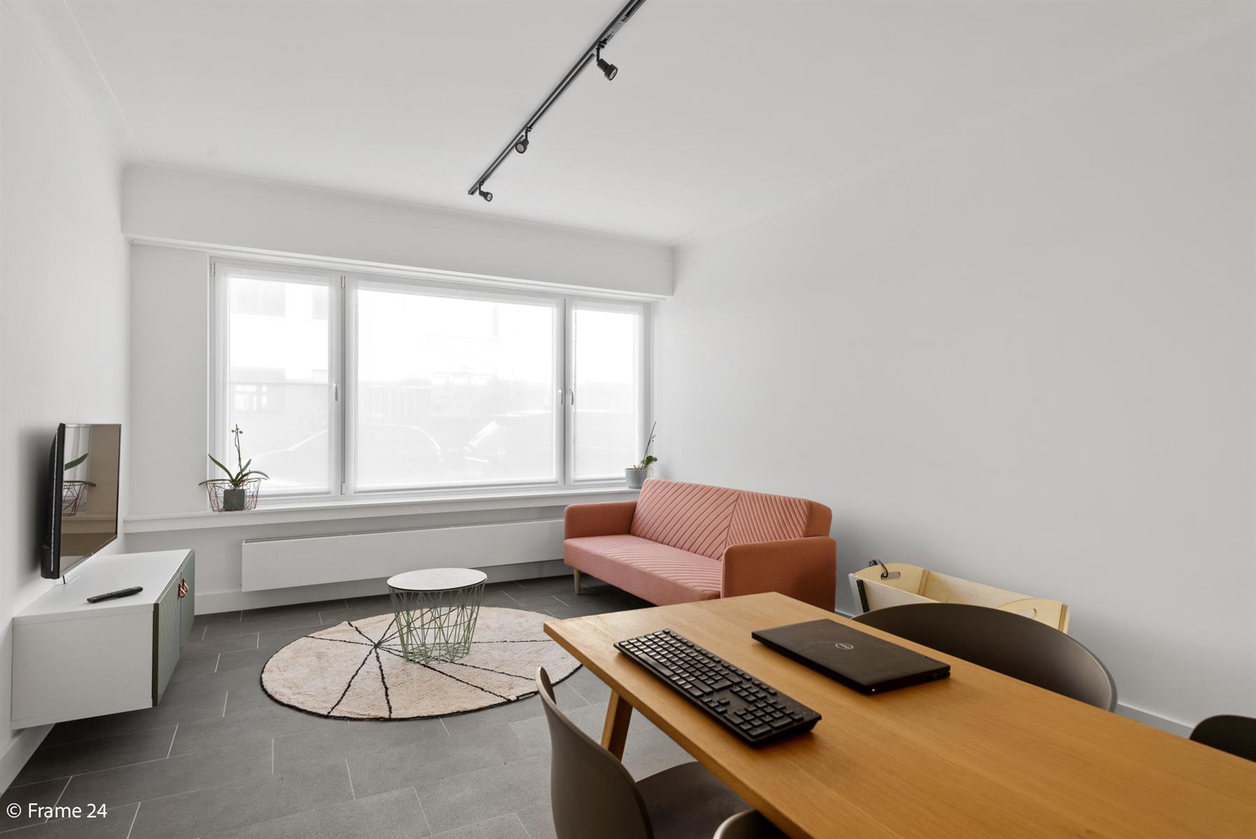 Gelijkvloers appartement met terras en tuin. - foto 3