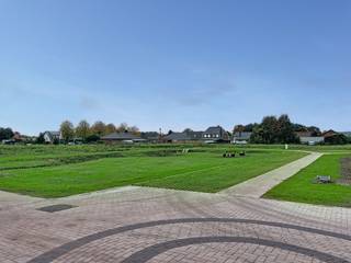 Zuidwest gerichte bouwgrond ( lot 12 ) te koop voor open bebouwing met een totale oppervlakte van 425 m².Nieuwe residentieel gelegen verkaveling in...