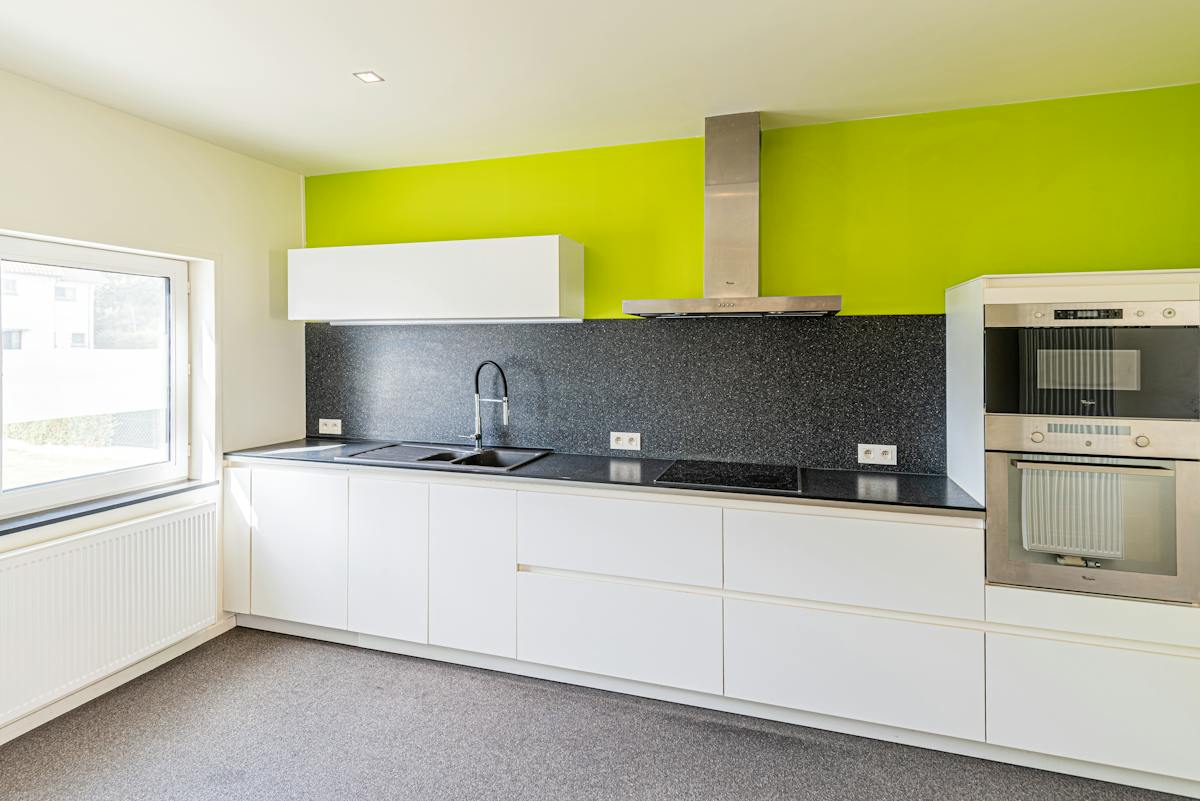 Gerenoveerde open gezinswoning met tuin in Boxbergheide - foto 4