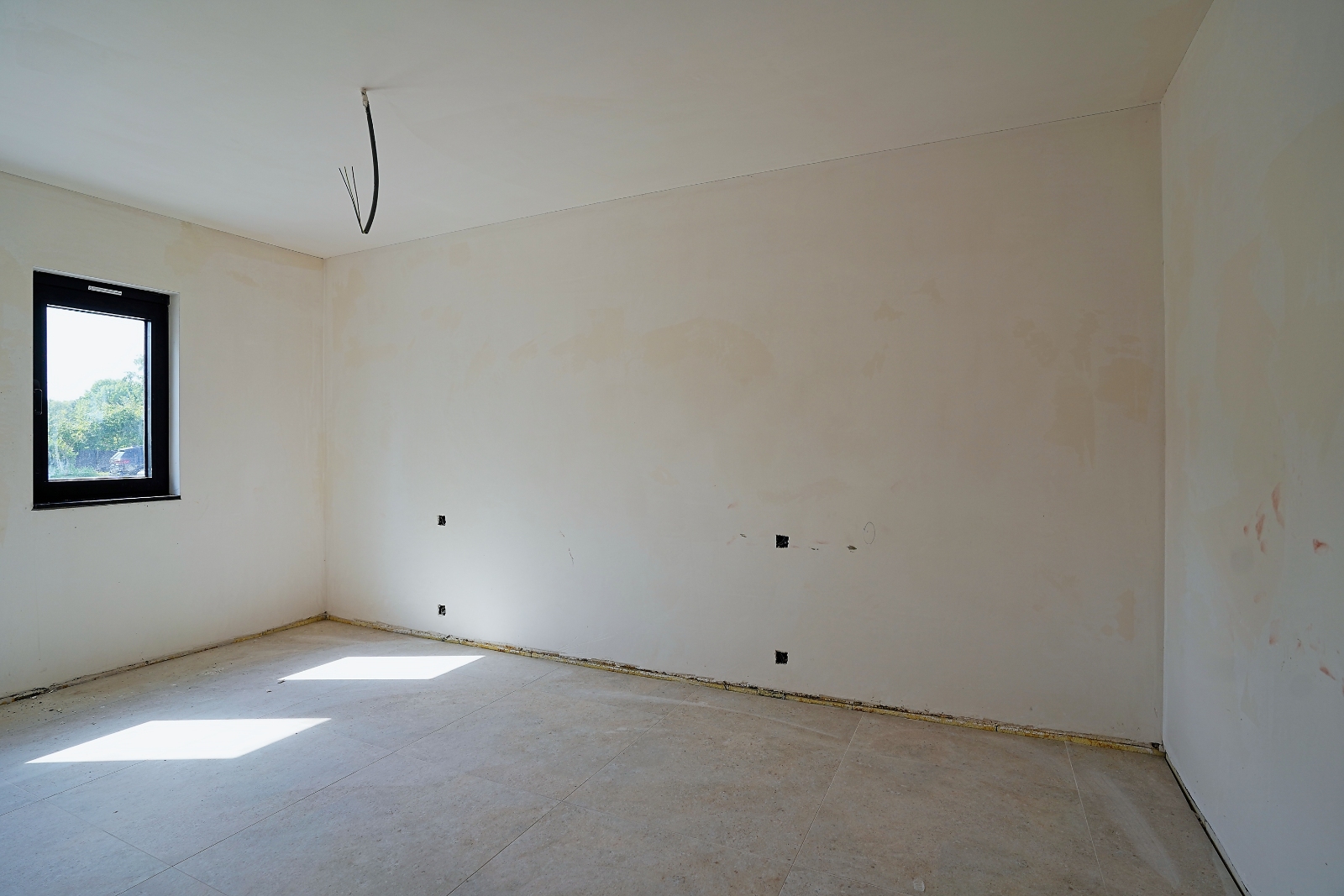 Net opgeleverd ruim nieuwbouwappartement met 2 slaapkamers en tuin in het centrum van Bornem. - photo 4