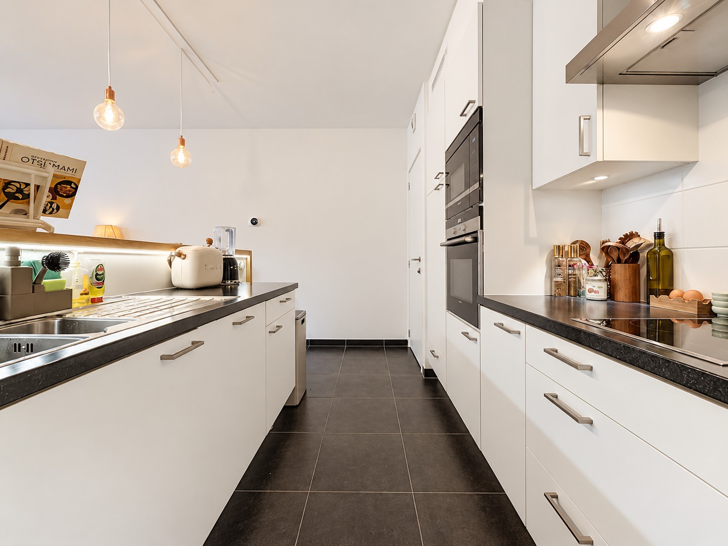 Jouw nieuwe thuis nabij Antwerpen: lichtrijk 2-slaapkamerappartement met zonnig terras & staanplaats - foto 4
