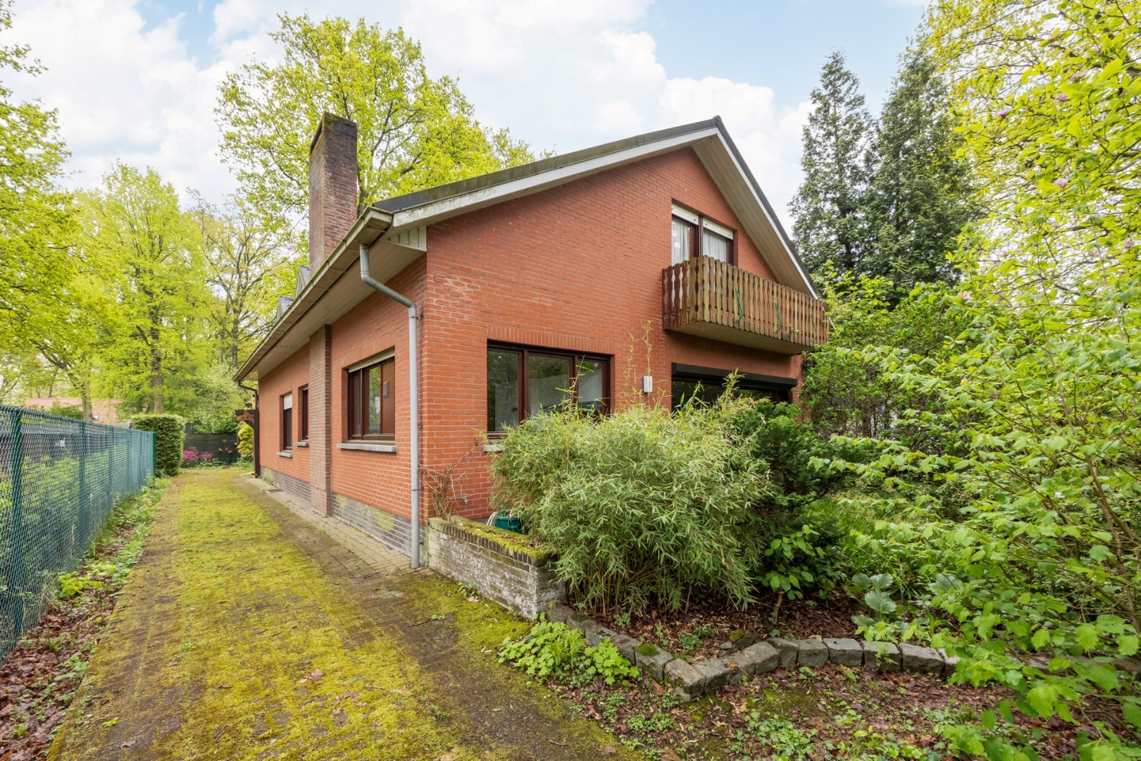 Ruime gezinswoning met 4 slaapkamers in het groene Hertebos - foto 1