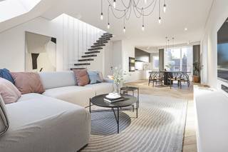 Appartement duplex récemment construit avec la possibilité d'un taux de TVA réduit de 6% !Ce projet de construction neuve à petite échelle "Den dijk" est situé à deux pas du centre-ville, de la gare et d'autres commodités.L'architecture épurée et intemporelle a été choisie en combinaison avec des techniques de construction économes en énergie telles que le chauffage par le sol. Situé aux deuxième et troisième étages, ce luxueux duplex comprend 146m². Cette unité offre la possibilité d'une finition sur mesure. L'étage supérieur sera livré comme une coquille. Vous entrez dans l'espace de vie avec cuisine d'où vous pouvez accéder à la terrasse orientée sud-est (10m²). Il y a également un hall de nuit avec des toilettes séparées, deux chambres et une salle de bain équipée. À l'étage, il y a une troisième chambre, un hall de nuit avec des toilettes séparées, une deuxième salle de bains et une grande pièce de rangement. Il y a également un abri à vélos commun et un local à poubelles.Pour plus d'informations ou une visite : britt@immodeprins.be - 03/776 06 55