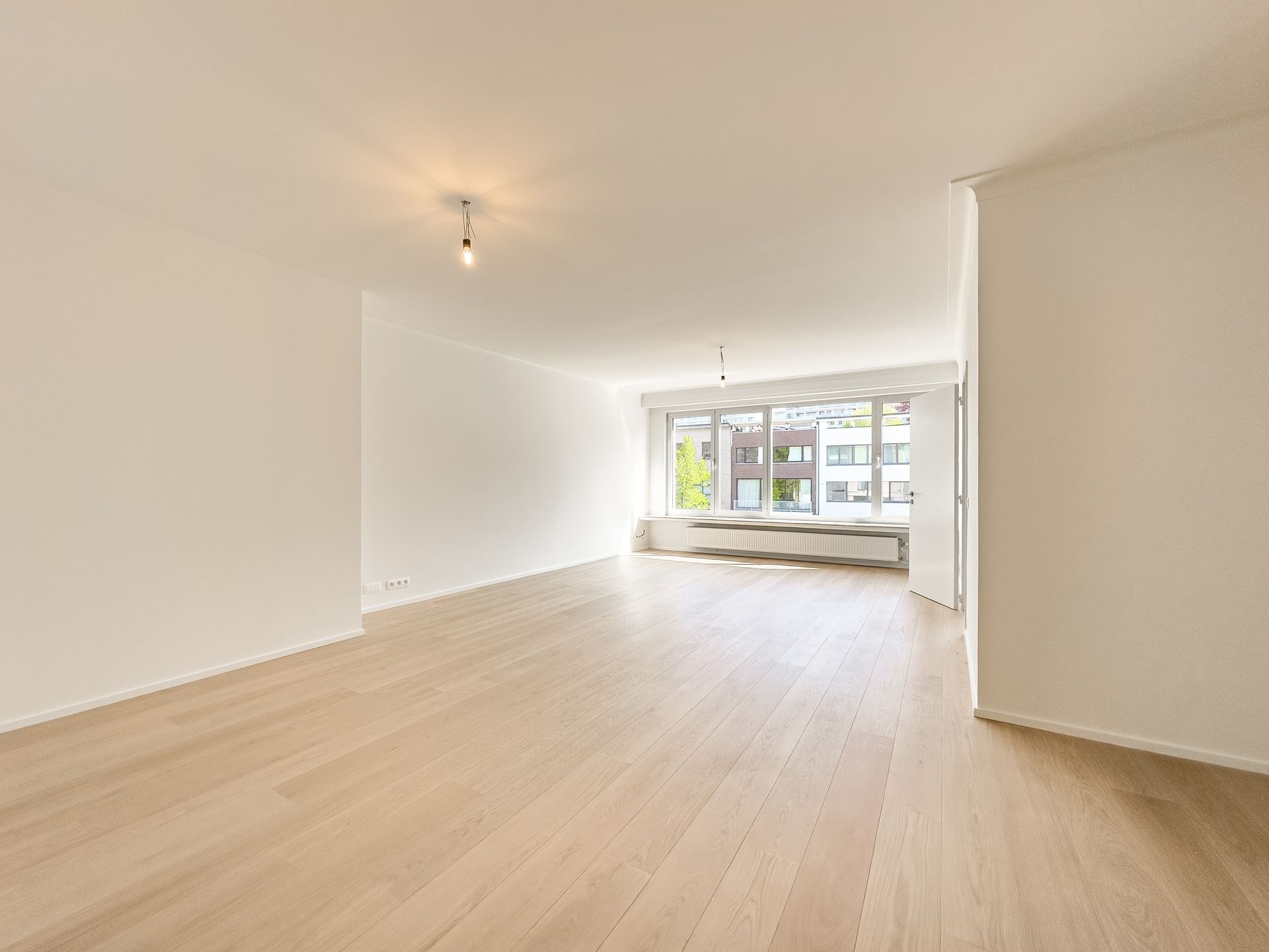 Gerenoveerd appartement met ondergrondse staanplaats - foto 4