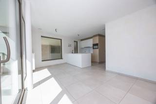 Discover this <strong>recently</strong> <strong>completed</strong> <strong>and</strong> <strong>move-in ready</strong> <strong>new build apartment</strong> in the stylish <strong>Residence</strong> <strong>Odrada</strong>, superbly located on Westendelaan in Middelkerke. Thanks to its tranquil location, within walking distance of the beach, the new casino, shops, restaurants, and public transport, you will enjoy a perfect combination of comfort, peace, and a vibrant coastal atmosphere.<br /><br />This bright apartment of <strong>78 m²</strong>, situated on the <strong>first</strong> <strong>floor</strong>, has been finished with high-quality materials and a contemporary design. The spacious living area with large windows is bathed in natural light and opens directly to the pleasant terrace, where you can enjoy the open view in peace.<br /><br />The <strong>fully equipped open kitchen</strong> features all modern appliances and seamlessly connects to the living area, making it ideal for cozy moments with family or friends. Furthermore, the apartment includes two full-sized bedrooms, a stylish bathroom with <strong>walk-in shower and double sink</strong>, a separate guest toilet, and <strong>a practical storage area</strong>, ensuring extra storage space and optimal living comfort.<br /><br />The residence also offers a <strong>communal</strong> <strong>bicycle storage</strong> and, thanks to the excellent <strong>EPC label A</strong>, you will live here in a particularly energy-efficient and future-oriented way.<br /><br />Whether you are looking for a <strong>permanent residence, a second home by the sea, or a profitable investment</strong>, this apartment provides all the advantages to meet your expectations. The sale takes place under the <strong>21% VAT regime</strong>, but if you meet the legal requirements, you can benefit from the <strong>reduced VAT rate of 6%.</strong><br /><br /><u>The purchase of an underground parking space is mandatory and costs € 35,000 excluding fees.</u><br /><br /><strong>Highlights</strong>
<ul>
<li>New build</li>
<li>2 bedrooms</li>
<li>EPC A</li>
<li>Prime location</li>
<li>6% VAT possible</li>
</ul>
Interested in this qualitatively finished new build apartment in a prime location on the Belgian coast? Contact us today for a visit and discover the comfort, space, and excellent location of this unique living opportunity.