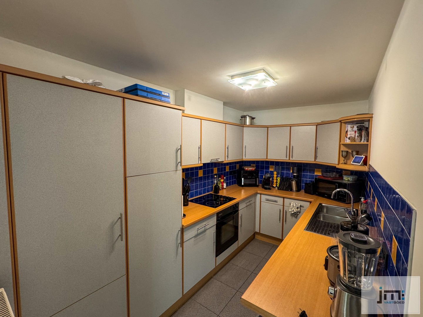 Ruim appartement met kelderberging en autostaanplaats - photo 4