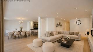 Topaanbieding – Uitzonderlijk ruim appartement gelegen in een stijlvolle residentie<br />Ontdek dit uitzonderlijk appartement, gelegen in een elegante residentie. Dit pand onderscheidt zich door zijn royale volumes, uitstekende ligging, hoogwaardige afwerking en een indrukwekkende gevelbreedte van ca. 10 meter. Bovendien geniet u van meerdere zonnige terrasjes, wat het wooncomfort compleet maakt.<br />Indeling:<br />Ruime inkomhal met gastentoilet en tal van ingemaakte kasten. De bijzonder ruime leefruimte afgewerkt met een massieve eiken parketvloer baadt in het licht en omvat een sfeervol salon met maatkasten en een gezellige gashaard. De open, volledig geïnstalleerde keuken is voorzien van alle hedendaags comfort, waaronder een Quooker-kraan, wijnfrigo, combi-oven en een Falcon fornuis. Vooraan bevinden zich twee aangename terrasjes.<br />Verder is er een aparte berging/wasplaats.<br />De master suite beschikt over ingemaakte kasten, een aparte dressing en een stijlvolle badkamer. De slaapkamer geeft rechtstreeks uit op het terras achteraan.<br />Tweede volwaardige slaapkamer. Aparte douchekamer.<br />De derde slaapkamer is bijzonder praktisch ingericht met een uitklapbaar stapelbed én een uitklapbaar dubbel bed, en beschikt over een aanpalende badkamer. Beide kamers geven uit op het tweede terras achteraan.<br />Dit appartement is een absolute aanrader dankzij de kwalitatieve afwerking, de uitzonderlijke ruimtes en het doordachte ontwerp.<br />Inclusief twee privatieve kelders in de residentie en fietshaken.